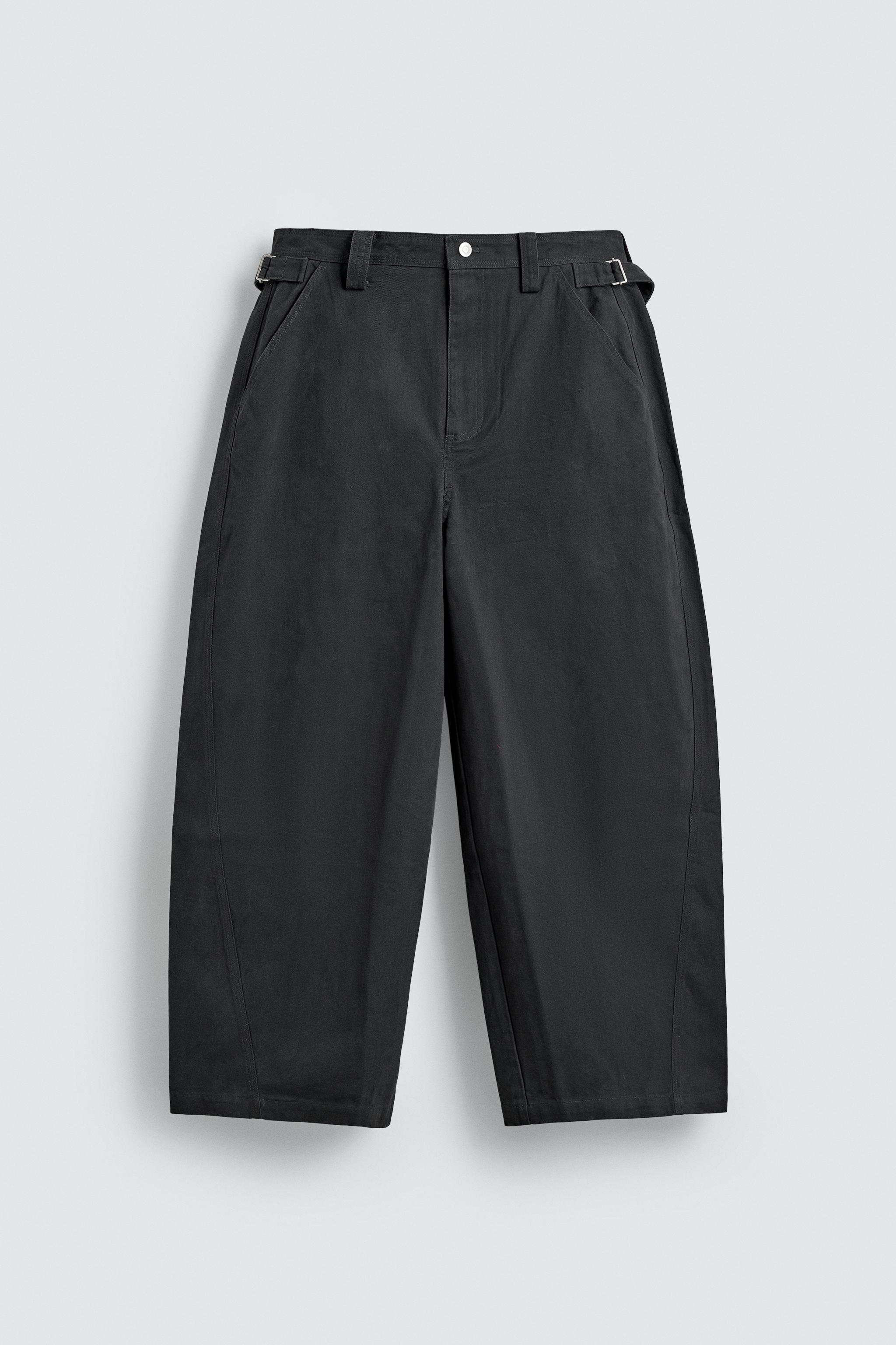 RELAXED FIT PANTS WITH TWISTED SEAM